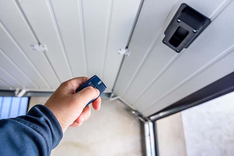 Installation porte garage au Cendre